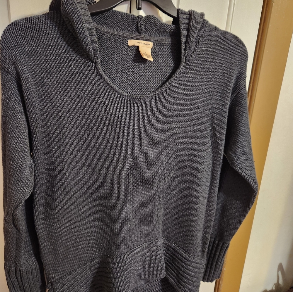 DKNY hooded sweater with decorative ribbed knitting on the waist.